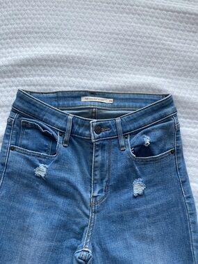Levi's High-Rise Skinny Jeans in Medium Blue with Light Distressing